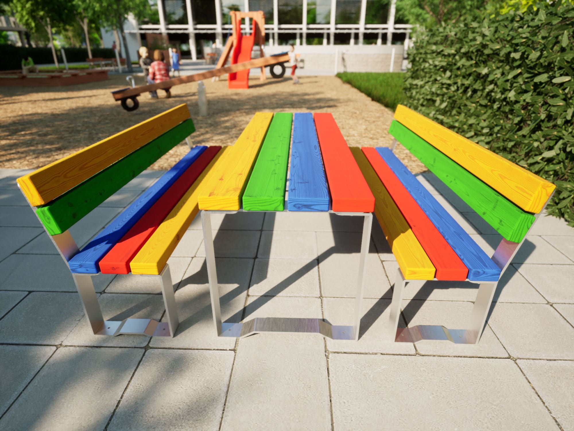 Bänke und Tische in bunten Farben für Kinder am Spielplatz